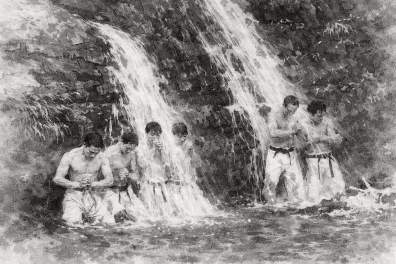 Sumi-e inspired illustration of a karate practitioner standing in disciplined stillness beneath a waterfall, symbolizing self-overcoming.